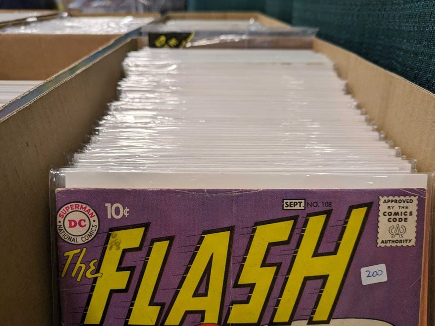 Photograph of a long box with comics in it