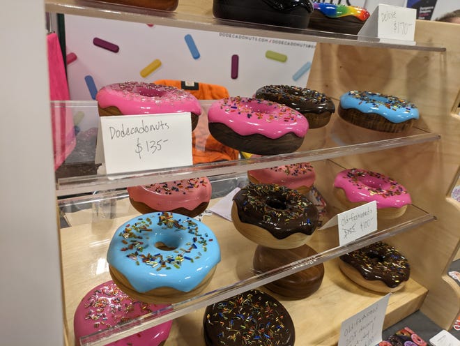 Photograph of donut shaped dice boxes