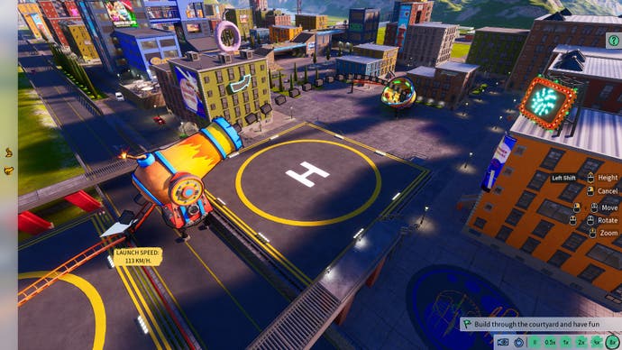 Screenshot from Park Beyond, showing a cannon pointed over a helipad