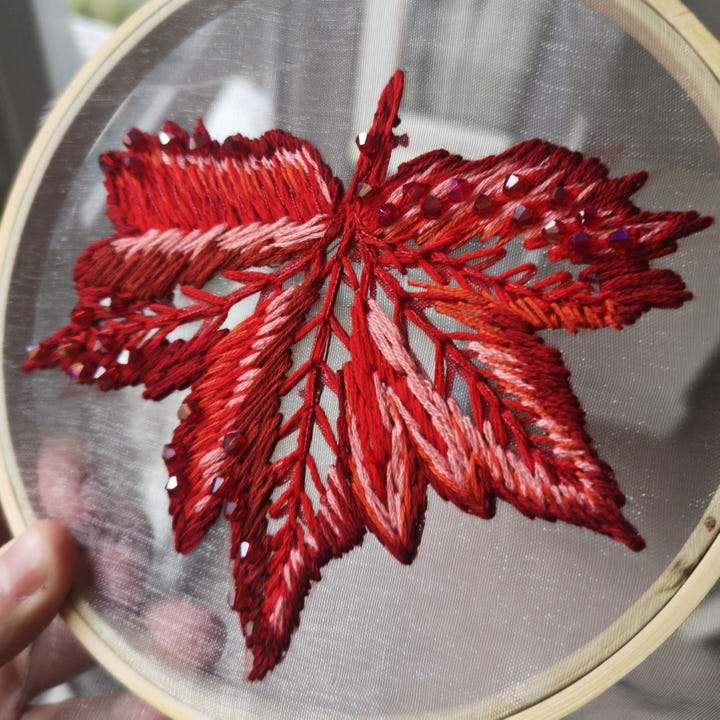 One of the many embroidered leaves for Sansa Stark's coronation gown.