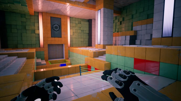 The player looks over a brightly coloured tiled room that slopes down the centre, in QUBE 10th: Anniversary.