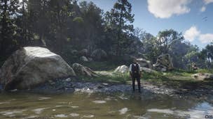 Arthur stands beside a river in Red Dead Redemption 2
