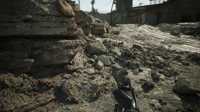robocop: rogue city screenshot showing nanite and vsm producing a natural environment with pebbles and a cliff face