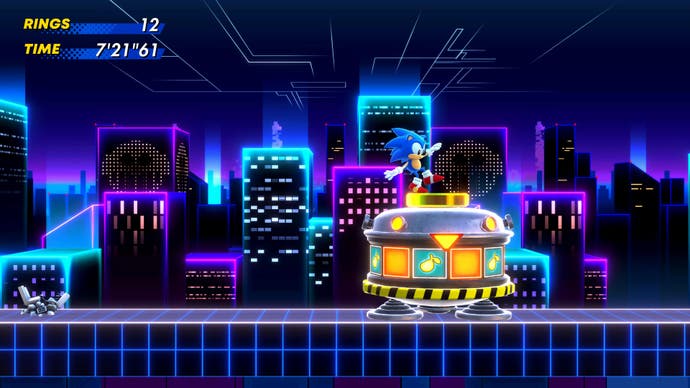 Sonic se tambalea en el borde de la cápsula de final de nivel en Cyber ​​Station Zone