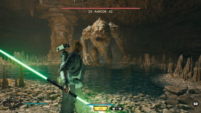 Recensione di Star Wars Jedi Survivor - schermata che mostra Cal alle prese con una doppia spada laser verde contro un Rancor