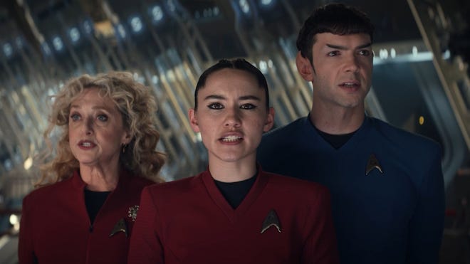 L-R Carol Kane as Pelia, Christina Chong as La’an, Ethan Peck as Spock in Star Trek: Strange New Worlds