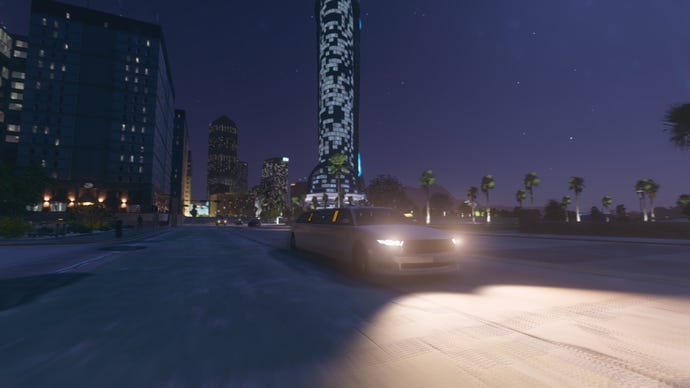 A limo drives down a city street at night in Saints Row.
