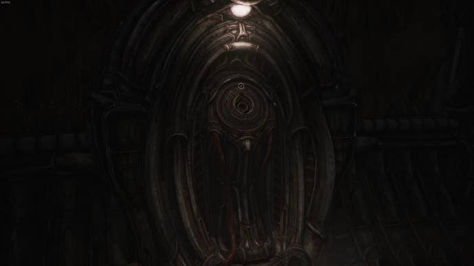 The player interacts with a pillar that has a puzzle in Act 2 of Scorn