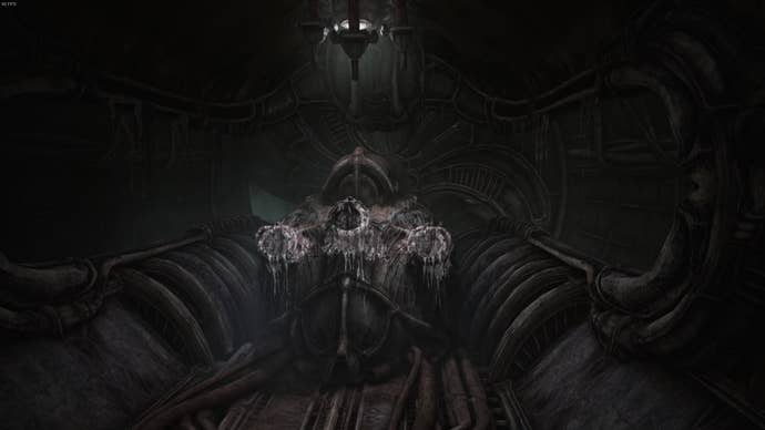 The player looks at where three valves once were powering a mechanical vent, somehow,  in Act 2 of Scorn