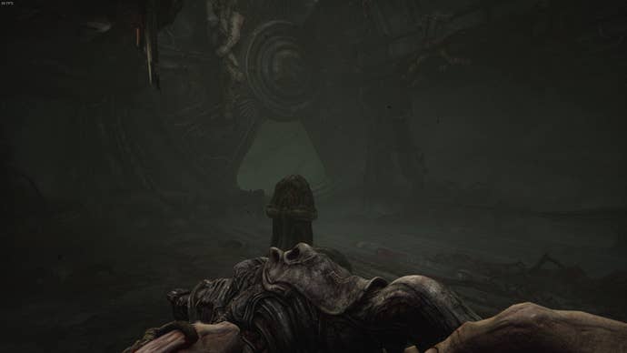The player faces a pillar that can be activated by their melee weapon in Act 3 of Scorn