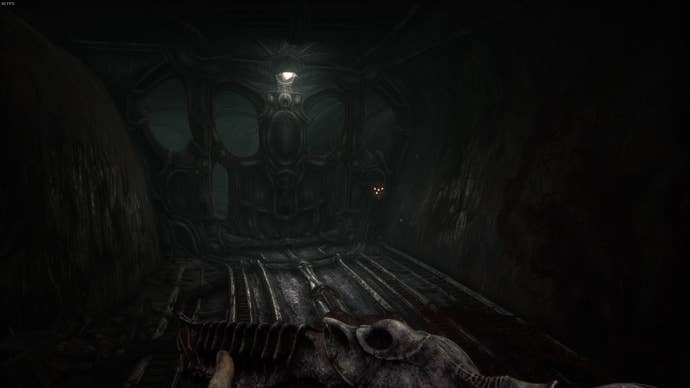 The player faces a closed gate in Act 4 of Scorn