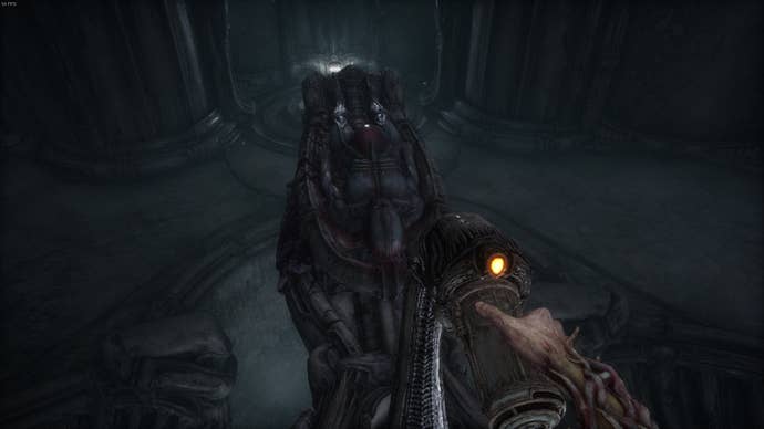 The player faces a pillar in Act 5 of Scorn