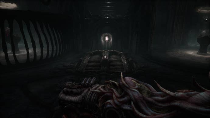 The player faces a panel they need to stand on in Act 5 of Scorn