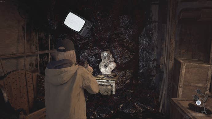 Rose Winters looks at the bust that is wearing the silver mask in Resident Evil Village's Shadows of Rose DLC