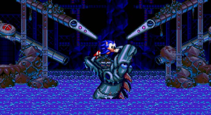 Sonic desperately tries to not get eaten by a mechanical dragon/sea monster, two pinball paddles over his head in Sonic Spinball.