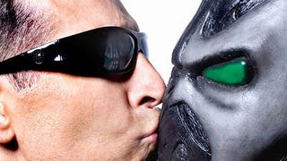 Todd McFarlane kissing a Spawn mask