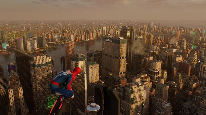 A shot of Spider-Man perching on a tall building in Spider-Man 2 for PS5.