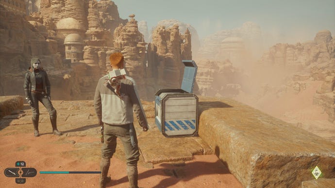 Star Wars Jedi Survivor screenshot showing Cal and Merrin on a high ledge overlooking the desert, stood near an open chest.
