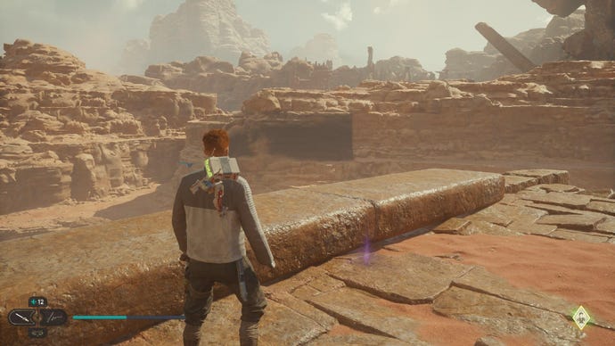 Star Wars Jedi Survivor screenshot showing Cal on a high ledge overlooking the desert.