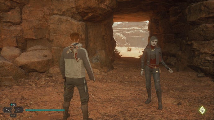 Star Wars Jedi Survivor screenshot showing Cal and Merrin stood near a dark tunnel in the desert.