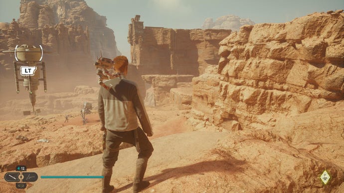 Star Wars Jedi Survivor screenshot showing Cal stoon on a ledge overlooking the desert.