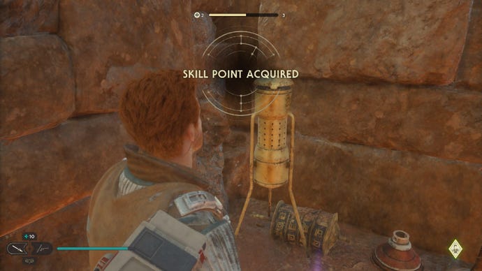Star Wars Jedi Survivor screenshot showing Cal acquiring a skill point in a sandy ruin.