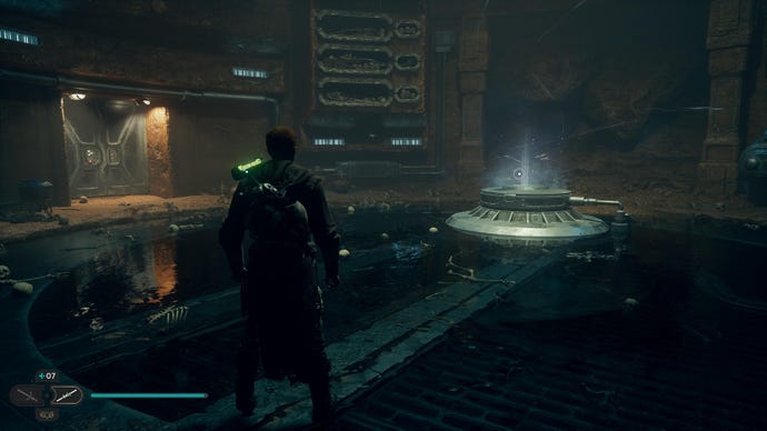 Star Wars Jedi: Survivor screenshot showing Cal stood in a dark cave, near a bright blue glow. There are bones and skeletons scattered across the floor.