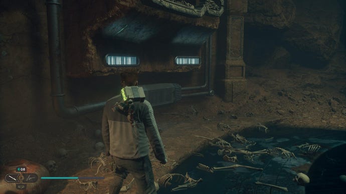 Star Wars Jedi Survivor screenshot showing Cal stood by some bones on the floor.