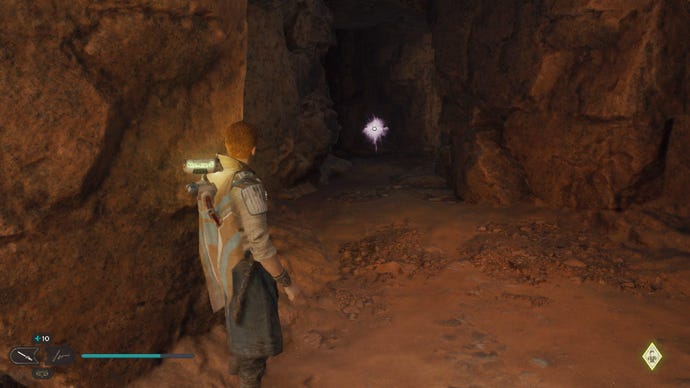 Star Wars Jedi Survivor screenshot showing Cal in a dark cave.