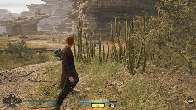 Star Wars Jedi Survivor screenshot showing Cal stood near a glowing plant.