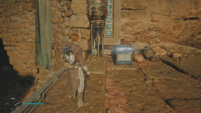 Star Wars Jedi Survivor screenshot showing Cal on a sandy ridge staring at a chest.