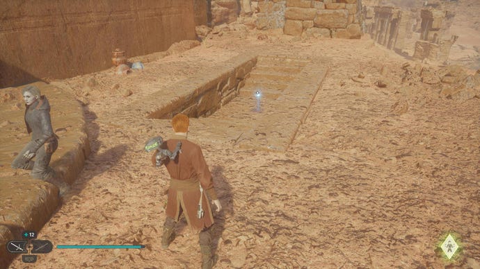 Star Wars Jedi Survivor screenshot showing Cal staring into a tomb atop some desert ruins. There's an essence glowing in the tomb.