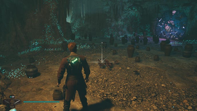 Star Wars Jedi Survivor screenshot showing Cal stood near a glistening Datadisc in a dark cave.