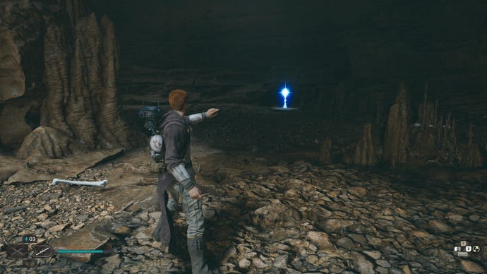 Star Wars Jedi Survivor screenshot showing Cal looking towards a perk in a dark alcove.