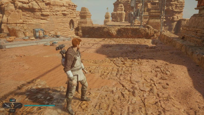 Star Wars Jedi: Survivor screenshot showing Cal stood in the desert.