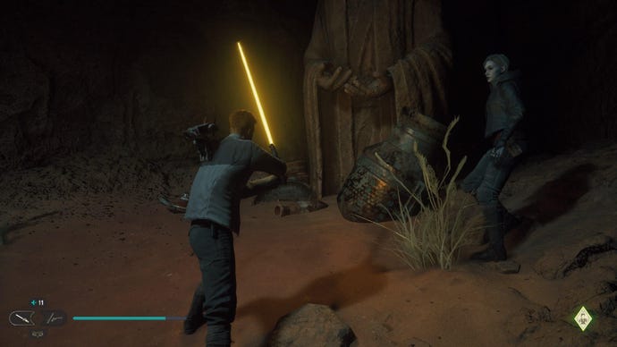 Star Wars Jedi Survivor screenshot showing Cal holding a yellow lightsaber up near a statue.