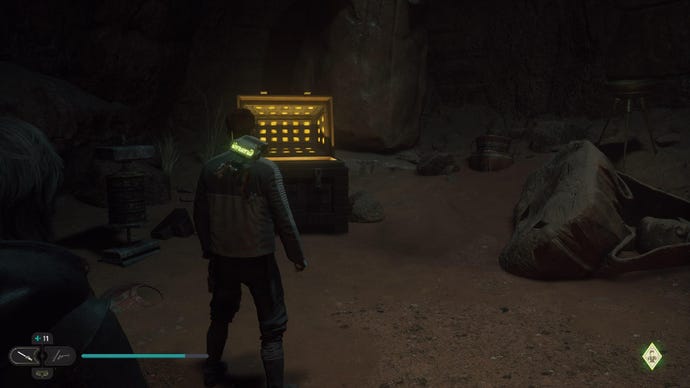 Star Wars Jedi Survivor screenshot showing Cal stood near an open chest underground.