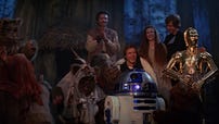 Star Wars Return of the Jedi, Han Solo, Princess Leia, Luke Skywalker, R2-D2, C-3PO, Lando, and Ewoks celebrating the destruction of the second Death Star on Endor
