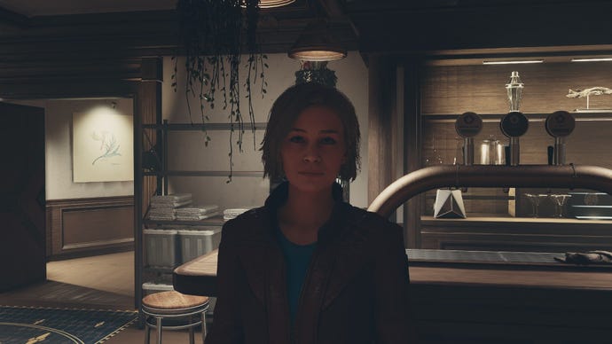 Starfield image showing Sarah Morgan stood in a dim bar at the Lodge.