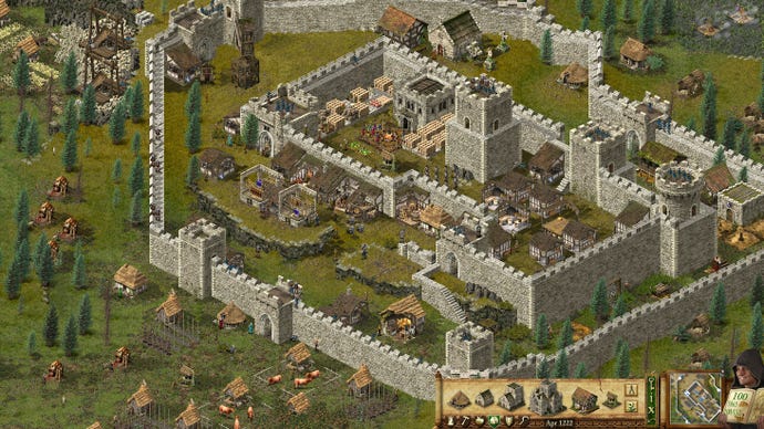 Screenshot aus Stronghold: Definitive Edition, der ein Schloss mitten im Grünen zeigt.