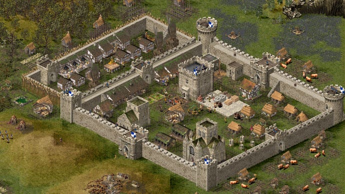 Screenshot from Stronghold HD, showing a castle in the middle of greenery.