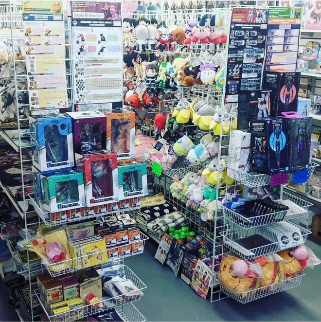 Interior image of Super Anime store featuring merchandise on shelves