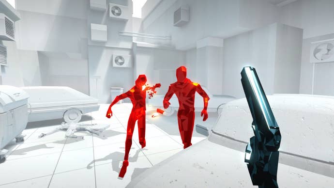 The player points their gun at two enemies in Superhot