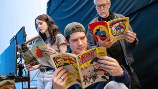 David Corenswet, Rachel Brosnahan, and James Gunn reading Superman comics on the set of Superman (2025)