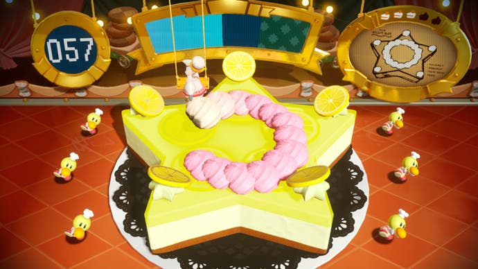 Princess Peach : capture d'écran Showtime montrant un mini-jeu de pâtisserie, de la crème tombant sur un gâteau.