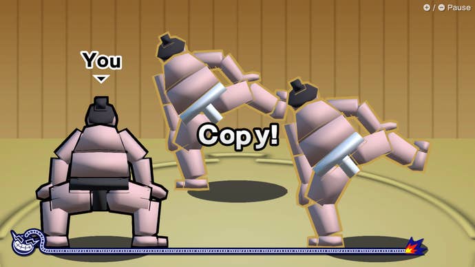 Trois lutteurs de sumo, vus de dos, adoptent tous la position traditionnelle des jambes accroupies.  Un panneau au-dessus d'eux indique « Copie ! »