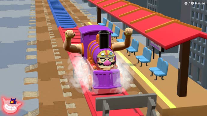 Wario, en tant que train, siffle et fait la fête alors qu'il arrive dans une gare low-poly.