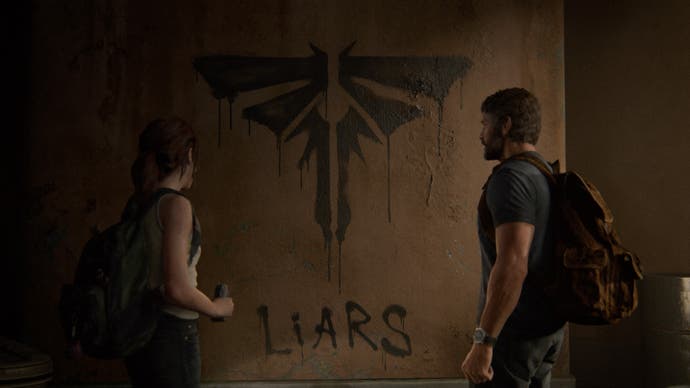 Ellie and Joel look at graffiti daubed on the wall. Below the Fireflies symbol, it says: LIARS.