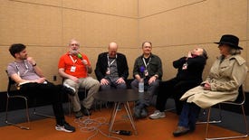 The voice cast of Team Fortress 2 (John Patrick Lowrie, Gary Schwartz, Dennis Bateman, Ellen McLain and Liz McCarthy) are interviewed by vid bud Liam in a drab conference room.