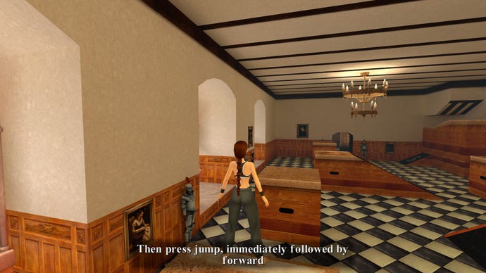 Lara se tient au bord d'un coffre-fort dans une grande salle de bal du Tomb Raider original.